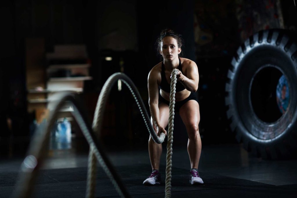 Woman using Ropes during Crossfit
